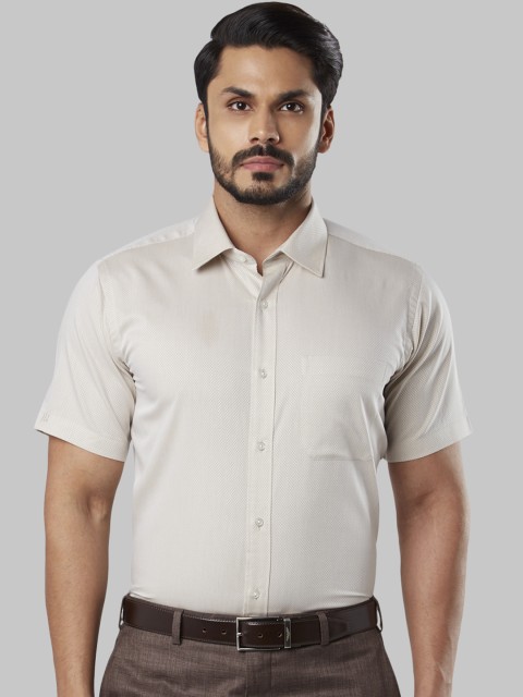 

Raymond Men Beige Regular Fit Self Design Formal Shirt
