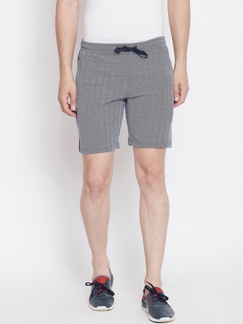 

Okane Men Navy Blue Self Design Regular Fit Regular Shorts