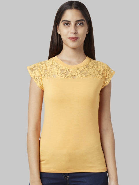

Park Avenue Women Orange Solid Round Neck T-shirt