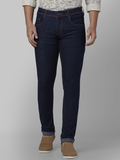 

Park Avenue Men Blue Tapered Fit Mid-Rise Clean Look Jeans