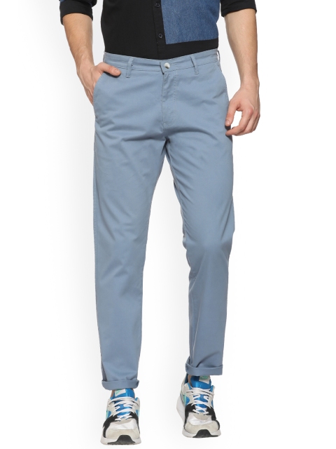

Campus Sutra Men Blue Slim Fit Solid Regular Trousers