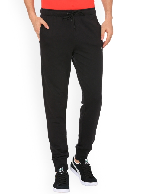 

Puma Men Black Solid PUMA Hero Pants TR cl Cotton Black-neutr Straight-Fit Joggers