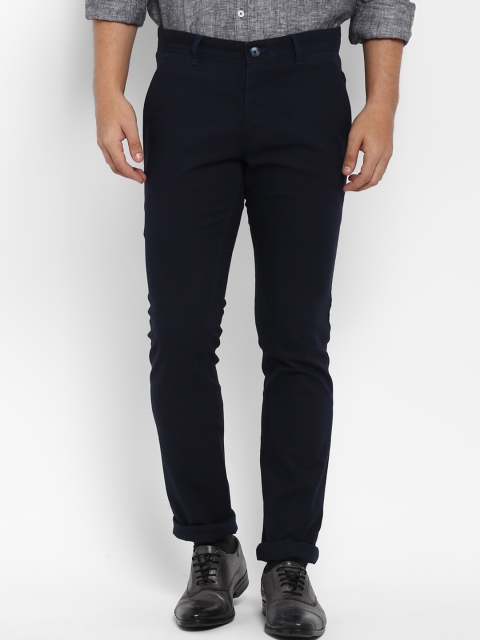 

Parx Men Navy Blue Tapered Fit Solid Regular Trousers