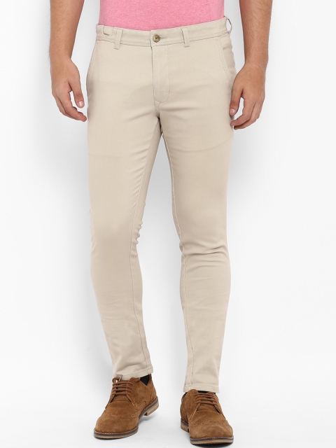 

Parx Men Beige Tapered Fit Solid Regular Trousers