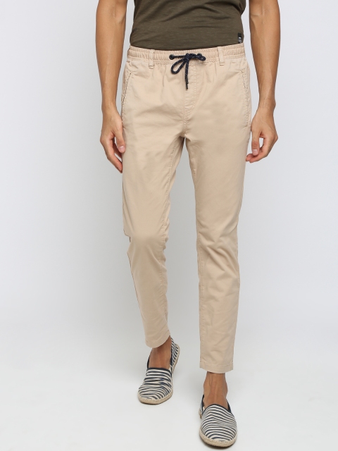 

Breakbounce Men Beige Solid Slim-Fit Trackpants