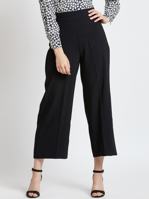 

COVER STORY Women Black Regular Fit Solid Regular Trousers