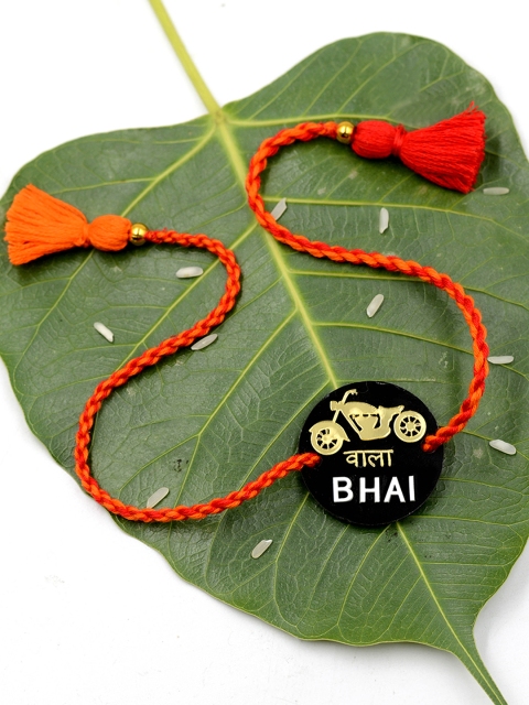 

Krafted With Happiness Gold-Toned & Black Printed Plastic Wraparound Rakhi