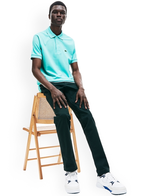 

Lacoste Men Turquoise Blue Solid Polo Collar T-shirt