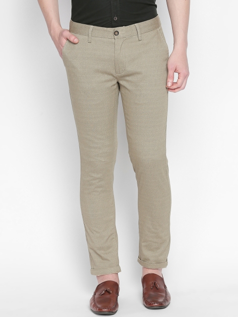 

Basics Men Beige Tapered Fit Self Design Regular Trousers