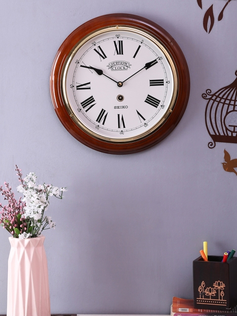 

SEIKO Cream-Coloured Round Solid Analogue Wall Clock