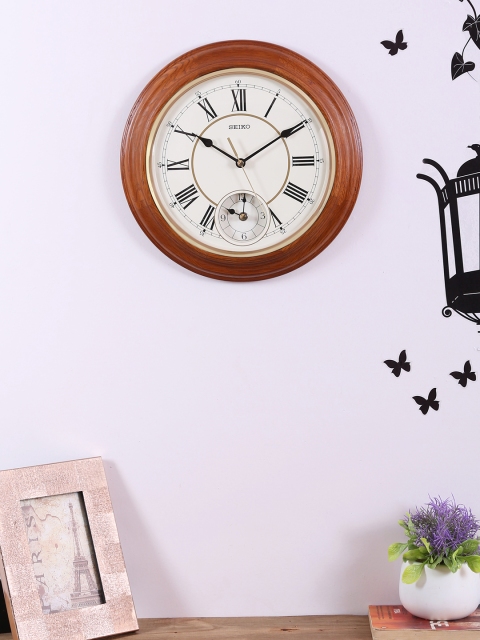 

SEIKO Cream-Coloured Round Solid Analogue Wall Clock