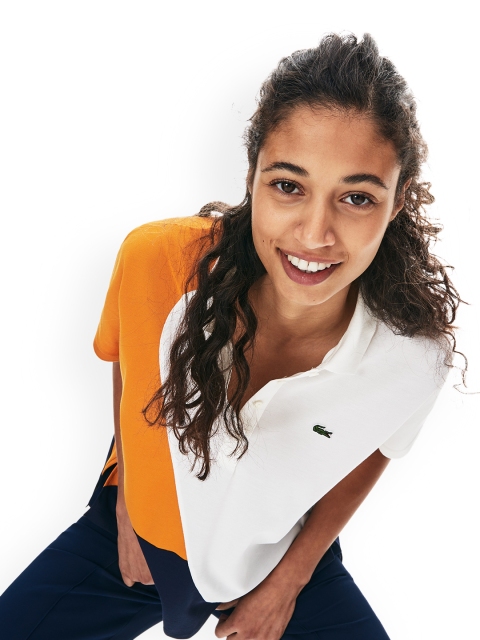 

Lacoste Women Orange and Navy Blue Colourblocked Polo Collar T-shirt