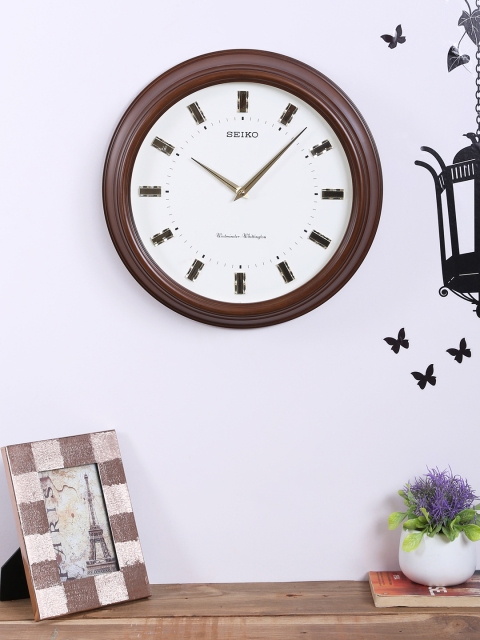 

SEIKO Cream-Coloured Round Solid Analogue Wall Clock