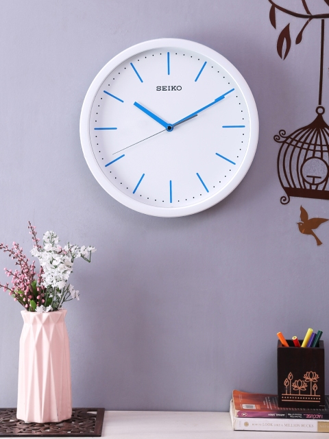 

SEIKO White & Blue Round Solid Analogue Wall Clock