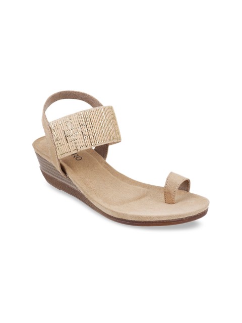 

Metro Women Beige Solid Wedges