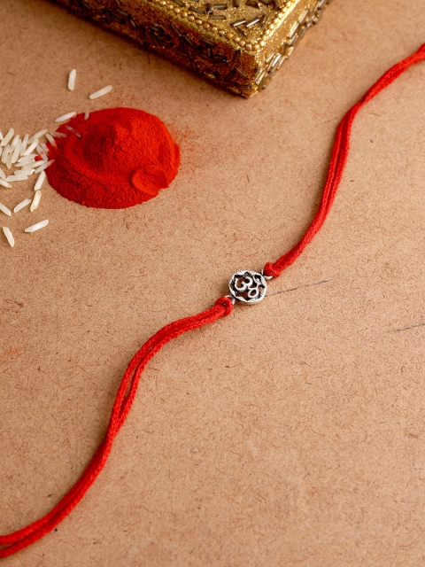 

Adorn by Nikita Ladiwala Silver-Toned Handcrafted Rakhi Bracelet