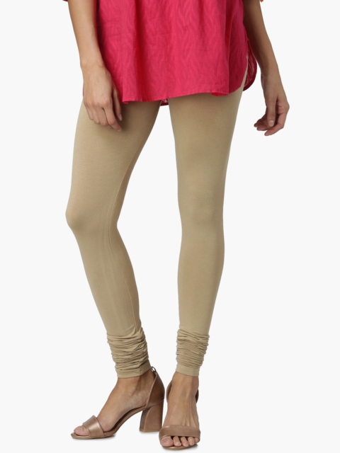 

Melange by Lifestyle Women Beige Solid Churidar Length Leggings