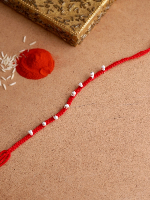 

Adorn by Nikita Ladiwala Silver-Toned Handcrafted Rakhi Bracelet