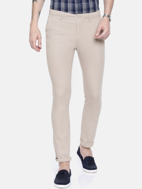 

Breakbounce Men Beige Slim Fit Solid Regular Trousers