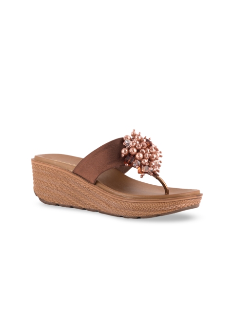 

Kraft Cellar Women Brown Solid Wedges