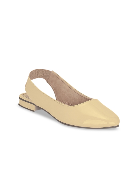 

Kielz Women Beige Solid Synthetic Patent Flats