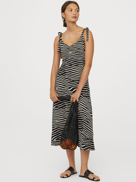 

H&M Women Black & White Animal Printed Dress with a Bell-Shaped Skirt