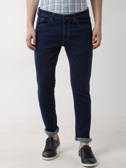 

Peter England Casuals Men Blue Tapered Fit Mid-Rise Clean Look Jeans