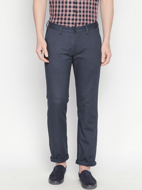 

Basics Men Navy Blue Tapered Fit Self Design Regular Trousers
