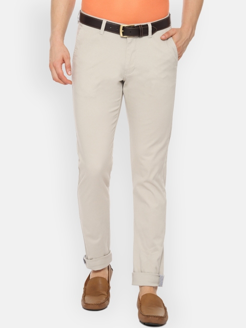 

Van Heusen Sport Men Beige Slim Fit Solid Regular Trousers