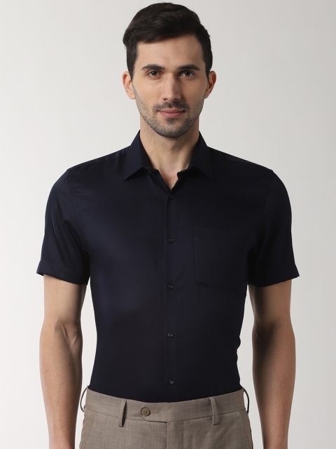 

Peter England Men Navy Blue Slim Fit Solid Formal Shirt