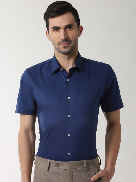 

Peter England Men Navy Blue Slim Fit Solid Formal Shirt