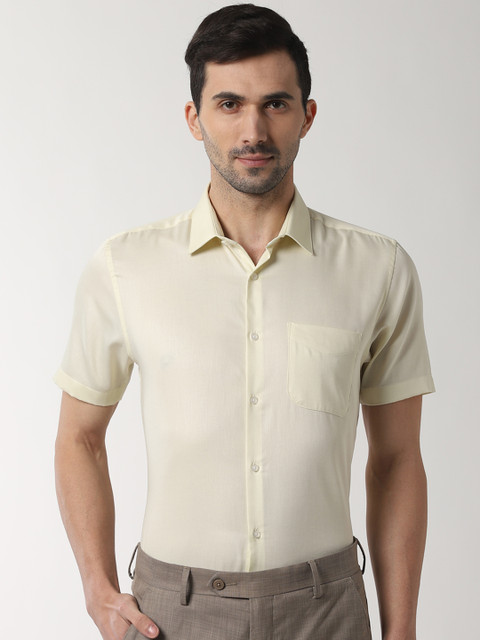 

Peter England Men Beige Slim Fit Solid Formal Shirt