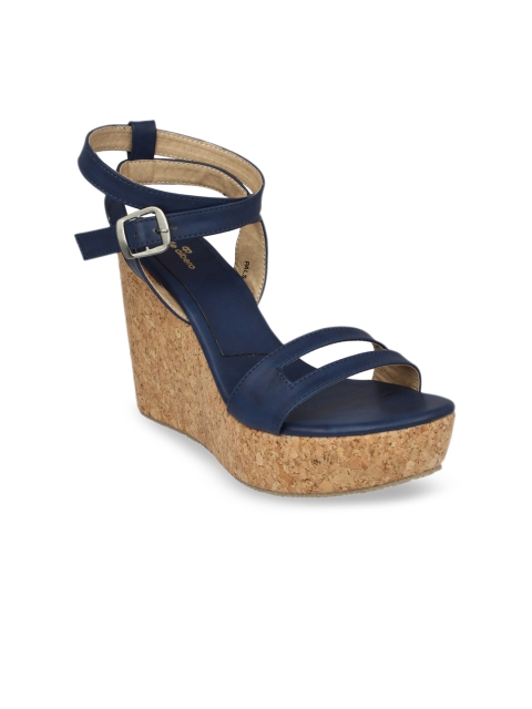 

pelle albero Women Blue Solid Heels