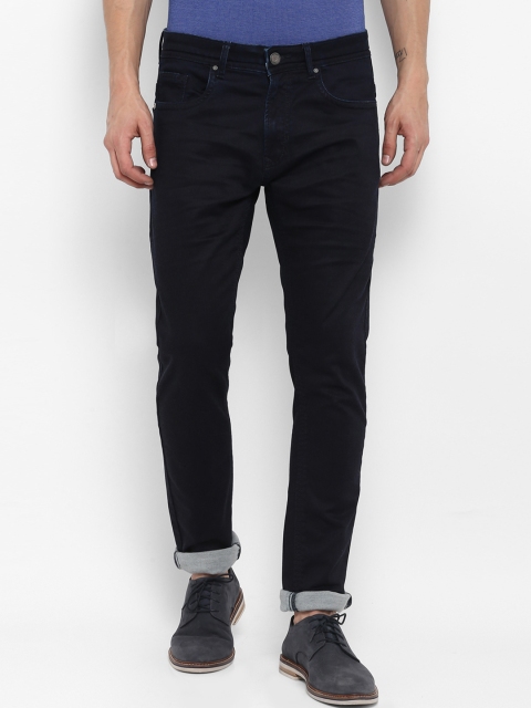 

SWISS MILITARY Men Navy Blue Tapered Fit Mid-Rise Clean Look Stretchable Jeans