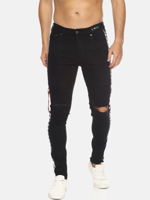 

KULTPRIT Men Black Skinny Fit Mid-Rise Slash Knee Stretchable Jeans With Print & Distress