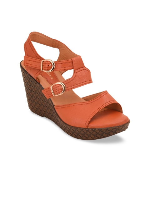 

pelle albero Women Orange Solid Sandals