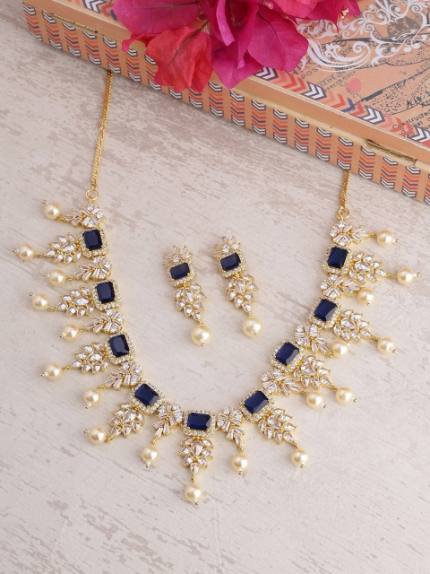 

Voylla Women Gold-Plated & White Handcrafted Heavily Embellished Jewellery Set