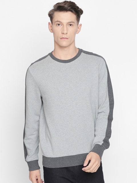 

Basics Men Grey Solid Sweatshirt