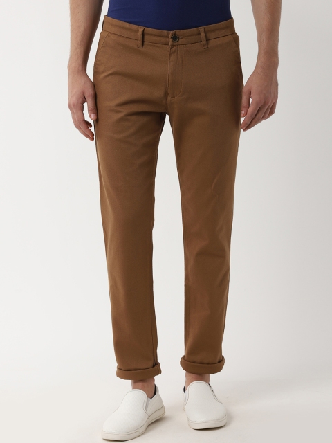 

Peter England Casuals Men Brown Slim Fit Solid Regular Trousers
