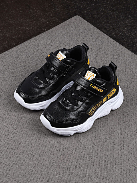 

Walktrendy Kids Black Solid Sneakers with Printed Detail