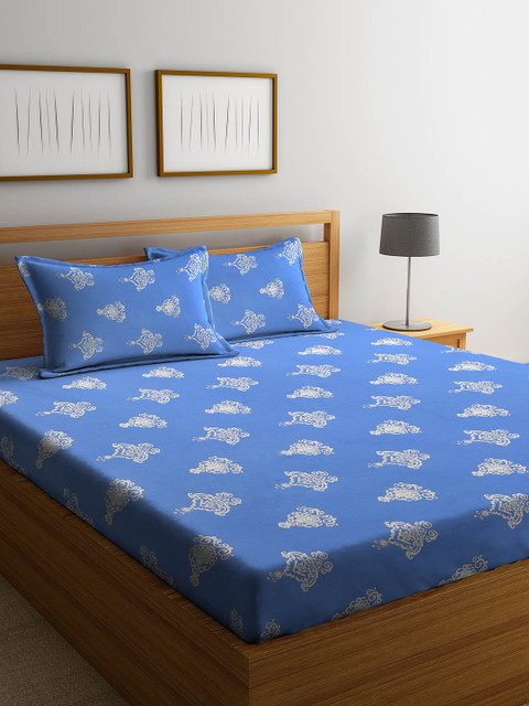 

Cortina Blue & Off-White Ethnic Motifs 144 TC Cotton 1 Queen Bedsheet with 2 Pillow Covers