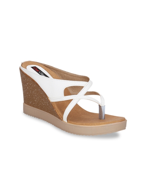 

Get Glamr Women White Solid Wedges