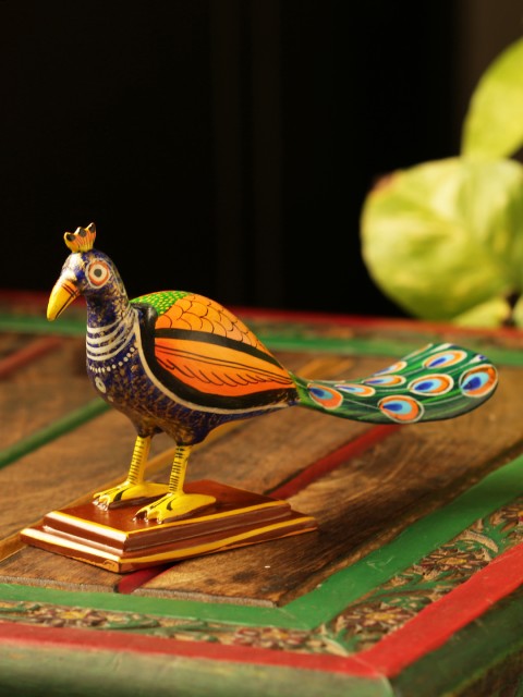 

ExclusiveLane Green & Orange Hand-Painted The Curious Peacock Table Showpiece