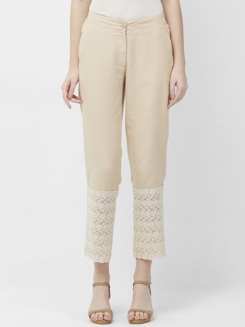 

Naari Women Beige Slim Fit Self Design Regular Trousers