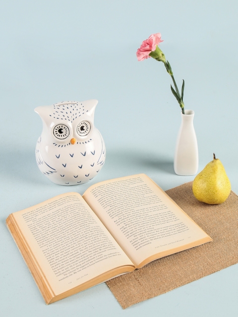 

Chumbak White and Blue Porcelain Horned Owl Coin Bank Showpiece