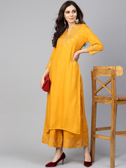 

Tulsattva Women Mustard Yellow Floral Printed Regular Kurta with Palazzos