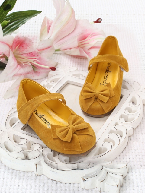 

Walktrendy Girls Yellow Solid Mary Jane
