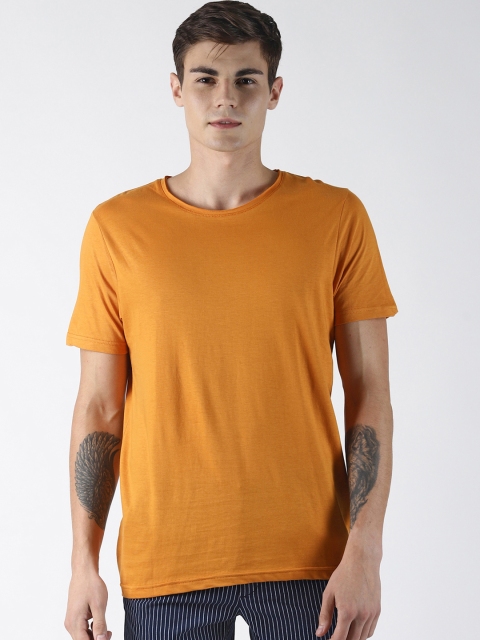 

Blue Saint Men Mustard Yellow Solid Round Neck T-shirt