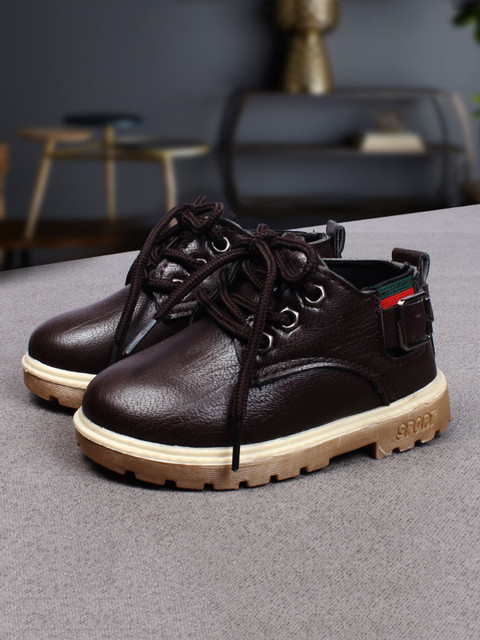 

Walktrendy Boys Brown Solid Synthetic Mid-Top Derbys