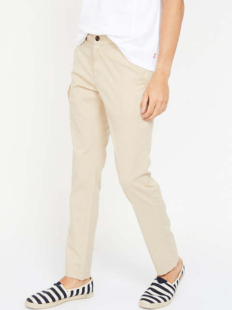 

UCLA Men Beige Tapered Fit Solid Chinos